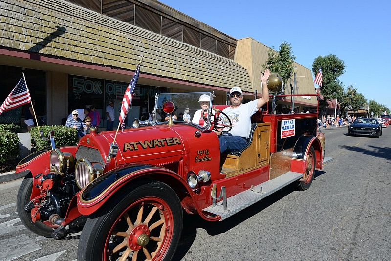 2016 Atwater 4th of July parade with Georgia Johnson as Grand Marshal in the 1919 fire truck by The Merced County Times